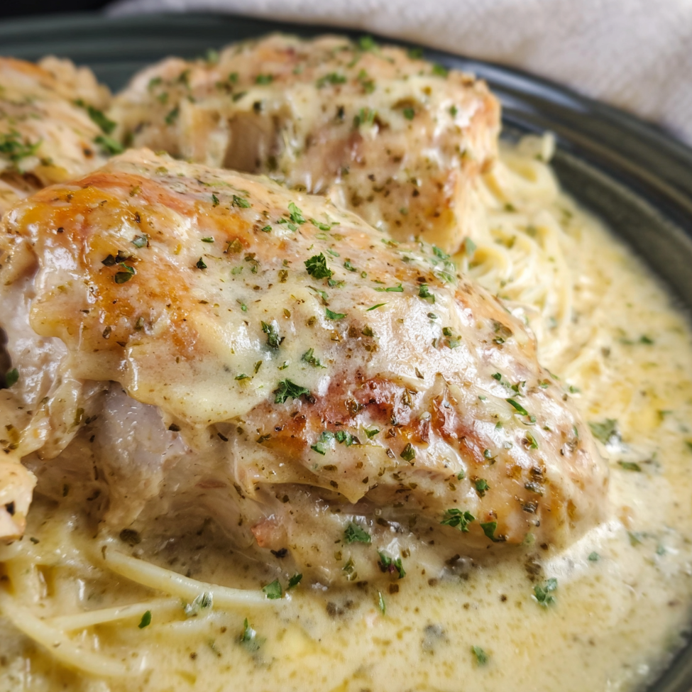 Plate of angel chicken with fresh parsley garnish