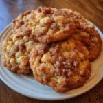 Baking tray of apple crumb cookies cooling