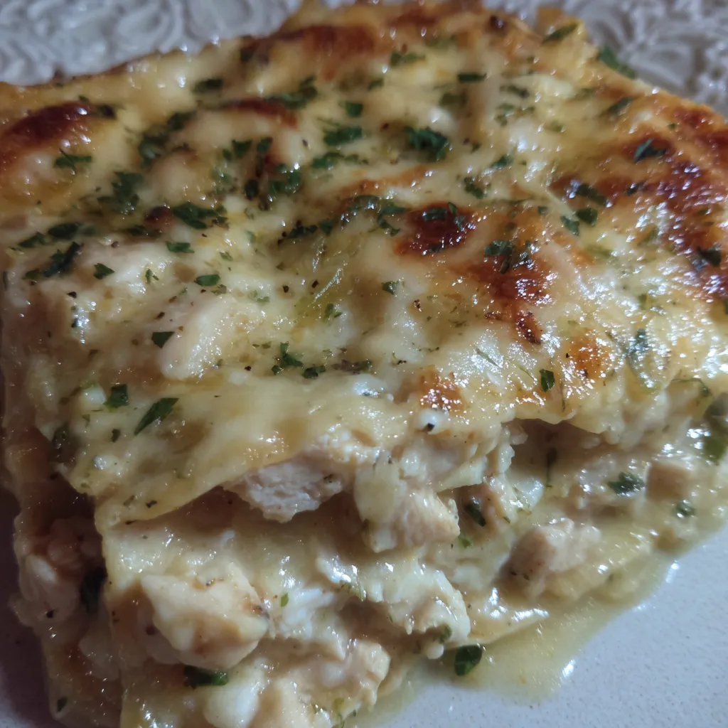 Cheesy white chicken enchiladas casserole